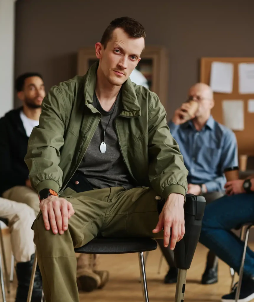 guy with prosthetic leg sitting in front of camera 2023 11 27 05 14 56 utc scaled e1721328769383