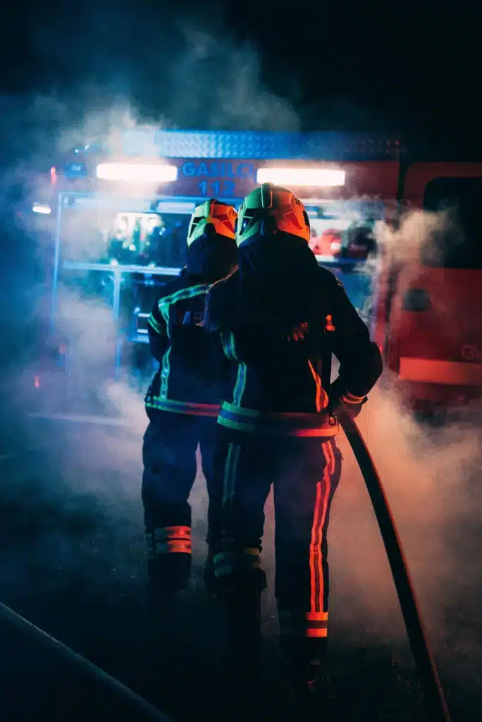 rear view of two firefighters responding to an eme 2023 11 27 05 31 52 utc