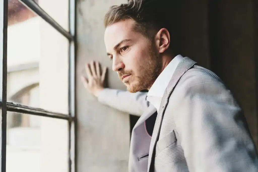 Businessman looks out of the window