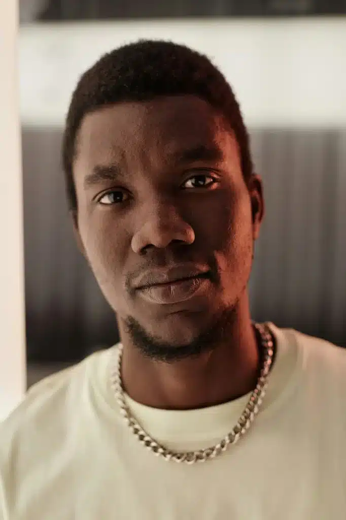 Close Up Young Black Man Looking at Camera with Serious Face Expression