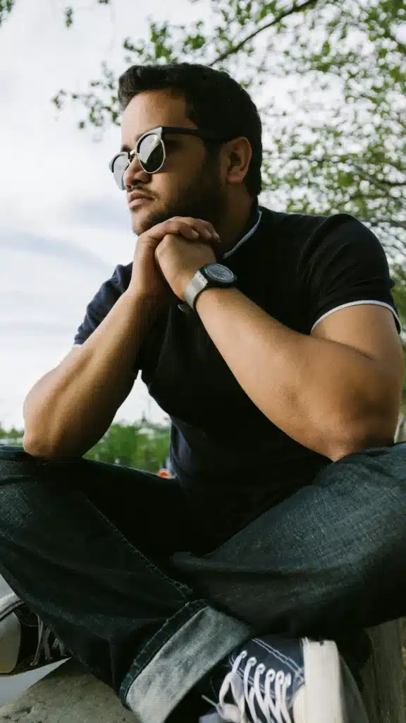 Man sitting legs crossed thinking