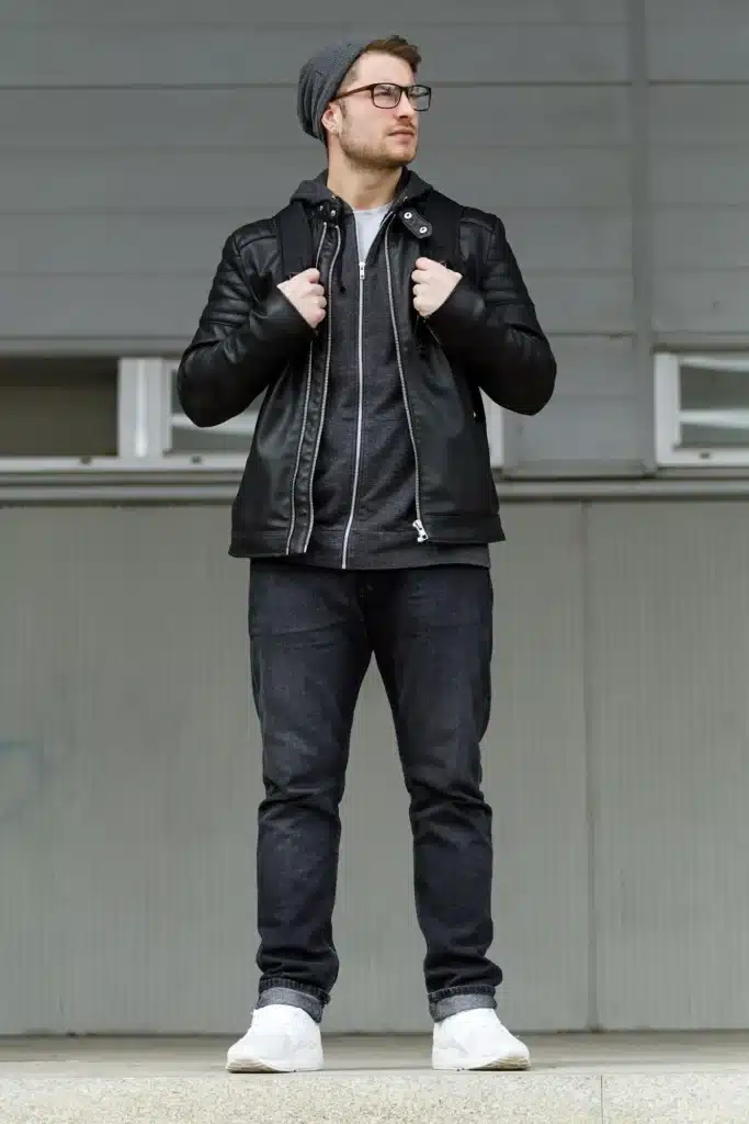 Modern young man posing in the street.