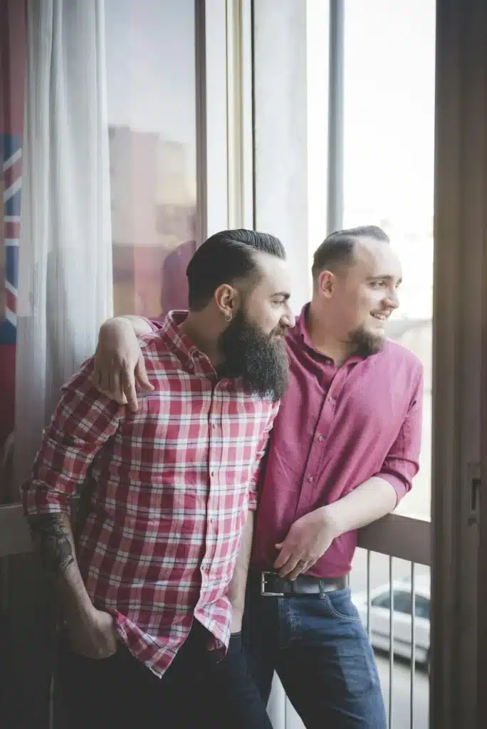 Two friends sharing a moment by the window