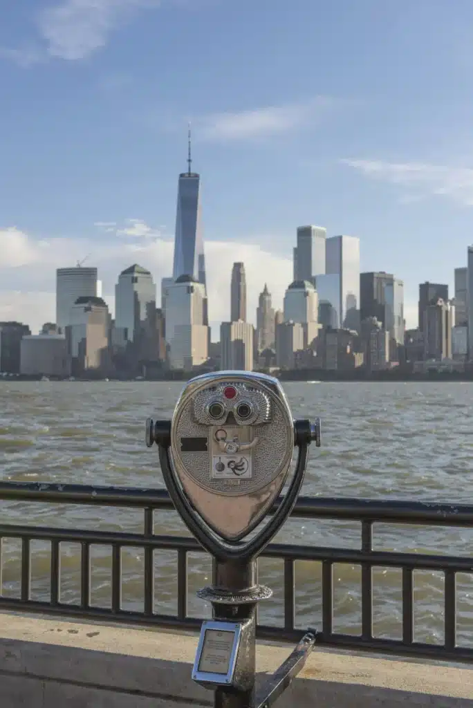 USA, New York City, Manhattan, New Jersey, cityscape with coin operated binoculars