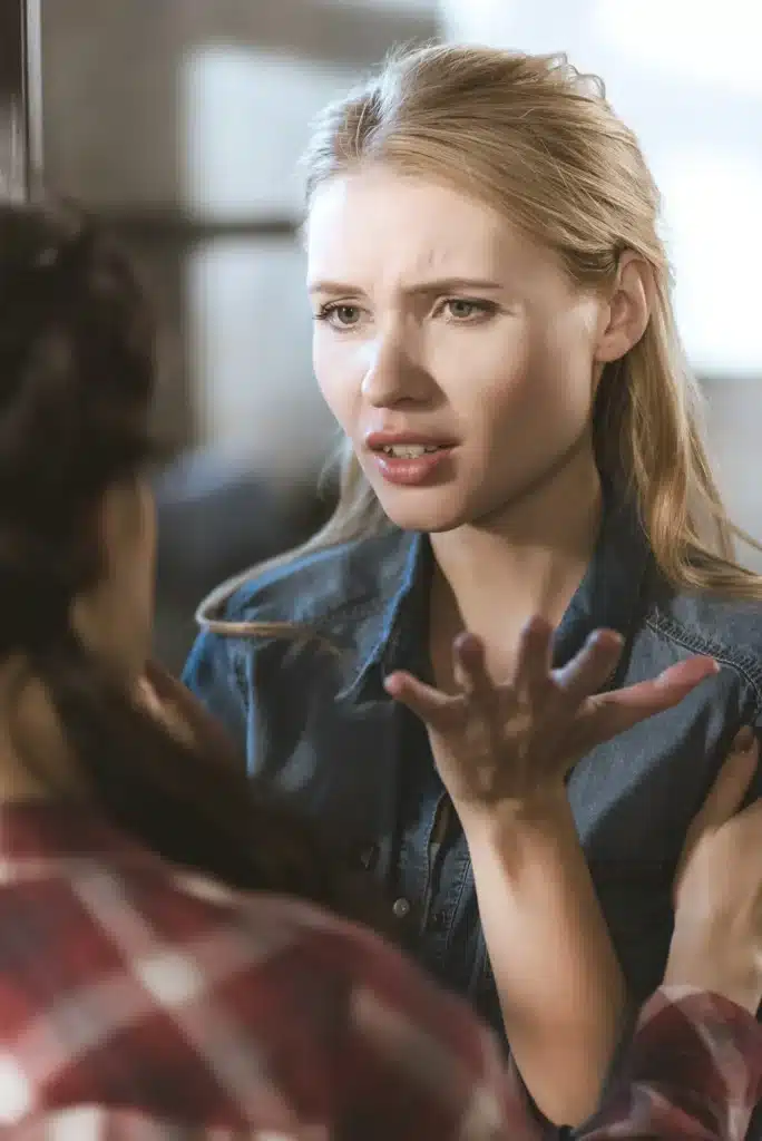 Young woman supporting her girlfriend in depression