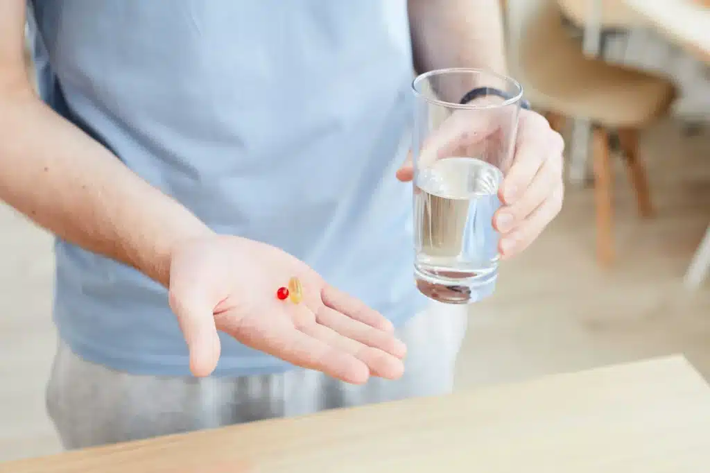 Man mixing adderall with alcohol