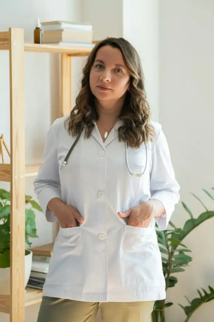 Portrait of a woman doctor in a white uniform